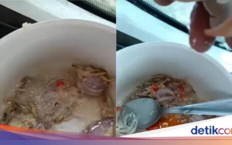 Gokil! Pekerja Ini Masak Nasi Goreng Ikan Bilis di Atas Tower Crane
