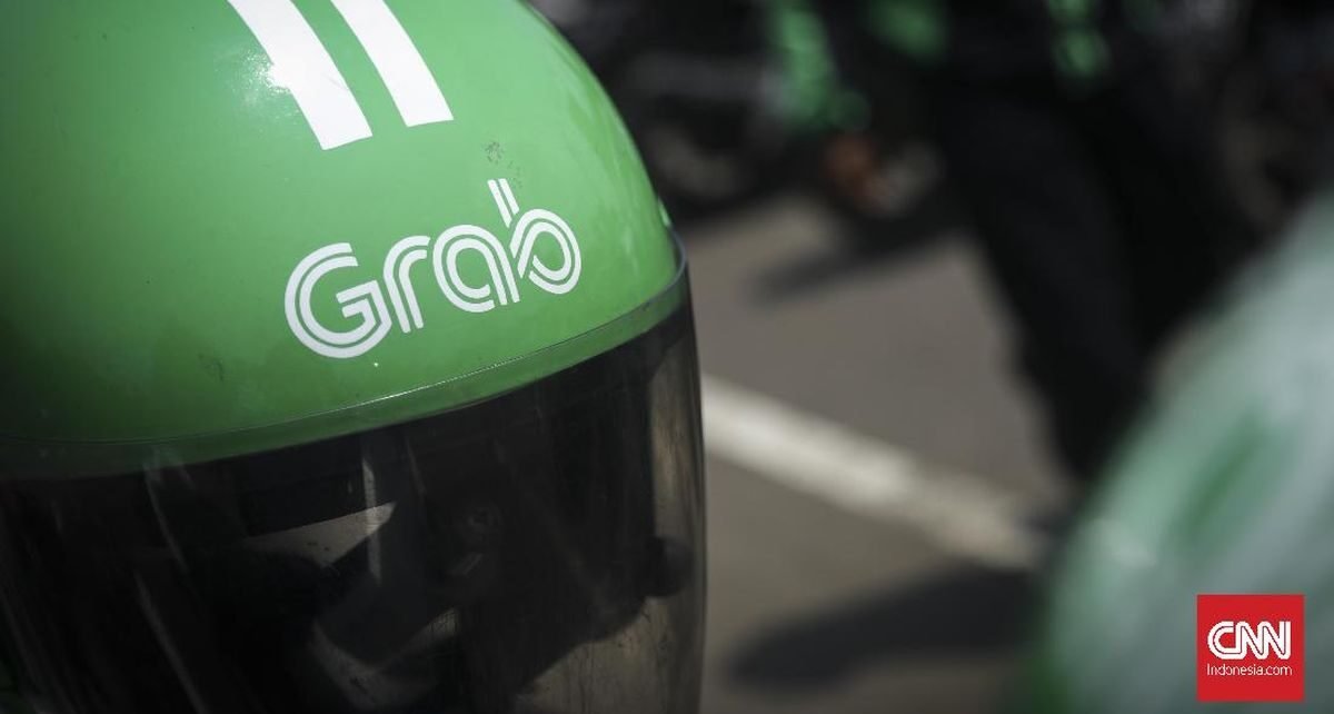 Grab Dikabarkan Cari Pinjaman Rp33 T Buat Akuisisi GoTo