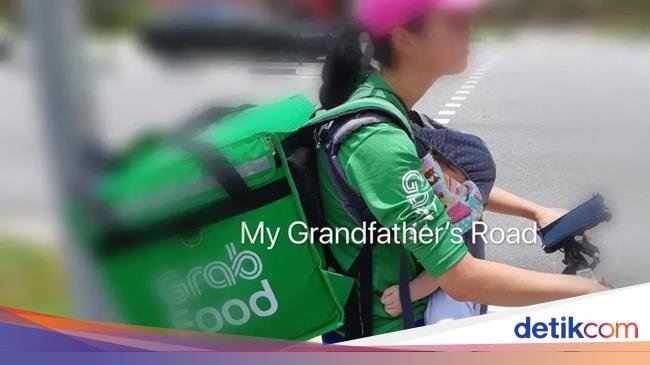 Bikin Haru! Wanita Ini Antar Makanan Pelanggan Sambil Gendong Anak