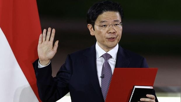 Singapore's Deputy Prime Minister Lawrence Wong is sworn in as Singapore's fourth Prime Minister at the Istana, in Singapore, May 15, 2024. REUTERS/Edgar Su/Pool